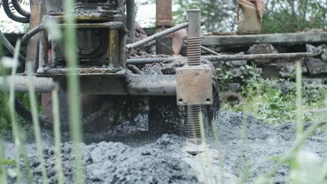 The-moment-bore-well-digging-machine-hits-water-table-water-bursts-out-of-the-ground-slow-motion