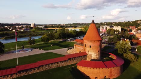 Aerial-footage-of-Kaunas-castle,-situated-in-Kaunas-old-town,-Lithuania-in-beautiful-sunny-evening