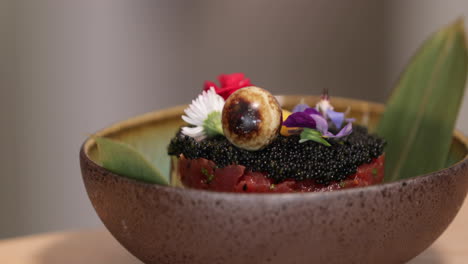 Food-Plating---Bowl-Of-Tuna-Tartare-With-Black-Roe-And-Fresh-Flowers