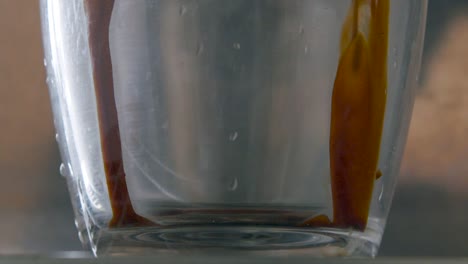 Close-up-Espresso-Pull-into-Glass-Slow-Motion
