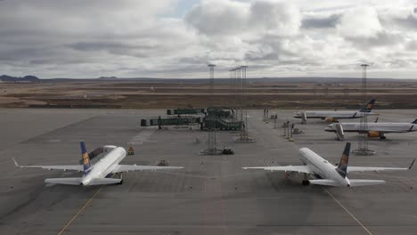 Grounded-fleet-of-Icelandair-parked-on-tarmac-due-to-global-pandemic,-travel-ban