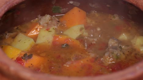 Close-up-slow-cooking-meat-and-vegetable-stew