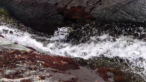 4k-video-of-a-powerful-water-flow-from-a-mountain-river-in-Peru,-Lagunas-of-Pichgacocha,-Ambo,-Huanco