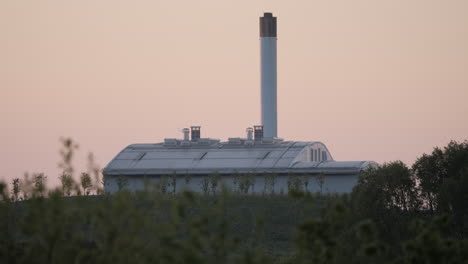 incinerator-factory-establishing-shot-at-sunset