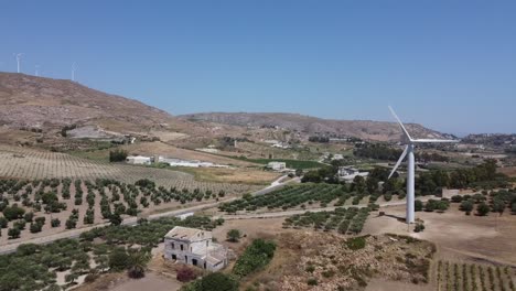 Aerial-view:-wind-turbine-on-traditional-old-Mediterranean-farm
