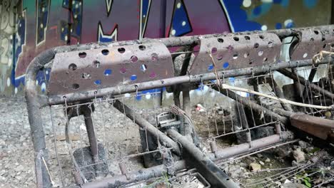 Burned-remains-vehicle-seat-vandalism-crime-drugs-dirty-underground-graffiti-tunnel