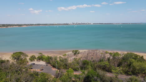 Moving-drone-shot-of-East-Point-Reserve-and-Beach-in-Darwin,-Northern-Territory