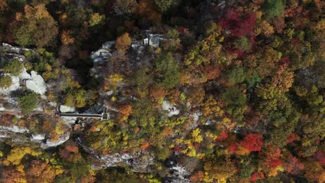 A-high-angle-view-of-Big-Schloss,-a-rock-formation-on-Great-North-Mountain,-the-border-between-Virginia-and-West-Virginia-in-the-autumn