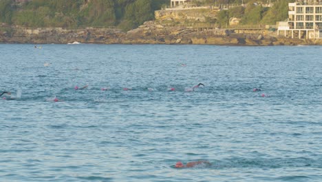 Triathlon-Swimmers-Racing-in-Ocean-Waters