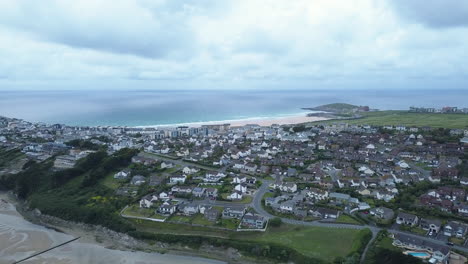 Aerial-View-Of-Buildings-On-Coastal-Cliff-In-Newquay,-Cornwall---static-shot