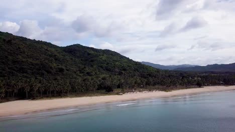 4K-Aerial-Drone-View-of-Long-Stretch-of-Nacpan-Beach-in-EL-Nido,-Palawan,-Philippines-Endless-Tropical-Beach