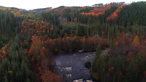 Aerial-Drone-flyover-of-River-Rapids-in-Scotland-Autumn