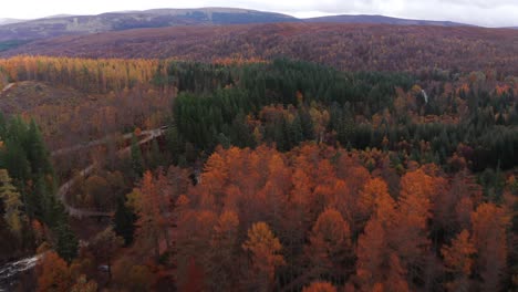 Aerial-Drone-flyover-of-River-Rapids-in-Scotland-Autumn
