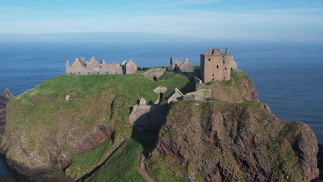 birds-eye-view-of-the-huge-rock-on-the-scottish-shore-where-the-ruins-of-the-once-mighty-dunnottar-castle-rise