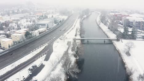 Flying-over-a-river-in-a-snow-blizzard