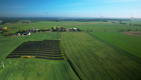 Renewable-Energy-Concept,-Solar-Panel-Plant-with-Wind-Turbine-Farm
