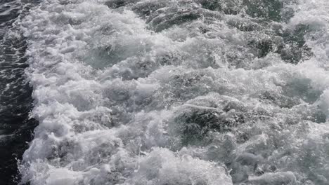Close-up-Of-Churning-White-Wake-From-The-Back-Of-A-Boat-Crossing-Bosphorus-In-Turkey---high-angle,-close-up