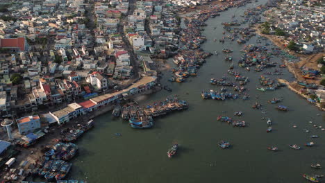 Aerial-rising-revealing-La-gi-town-and-coast-side,-Vietnam