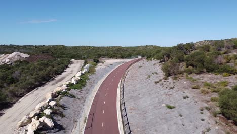 Aerial-Flyover-Cycle-Path-To-Reveal-Tamala-Sand-Dunes,-Perth-Australia