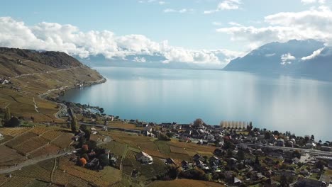 drone-panning-shot-of-Lavaux-Vineyards,-geneva-lake-and-small-villages