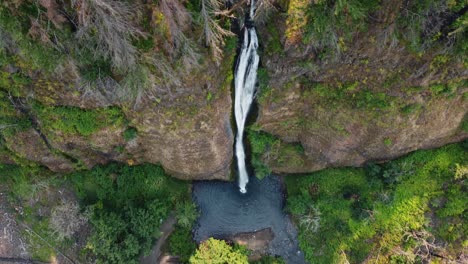 Overhead-drone-shot-of-Horsetail-Falls-powerfully-cascading-over-the-canyon-in-the-Columbia-River-Gorge-in-Oregon