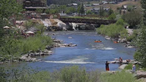People-enjoying-the-river-in-Pagosa-Springs,-Colorado