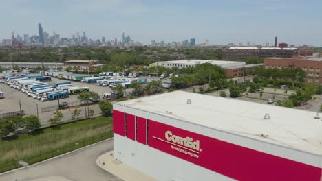 Aerial-Pullback-Reveals-ComEd,-An-Exelon-Company,-with-Chicago-Skyline-in-Background