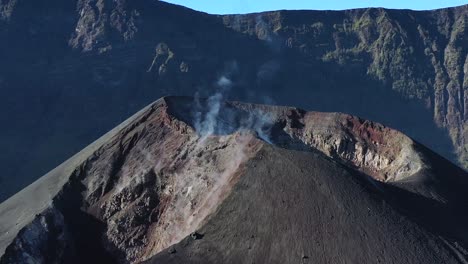 Close-up-of-active-crater-cone-of-Mount-Rinjani-Volcano-in-Indonesia,-Aerial-orbit-around-shot