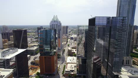 Aerial-view-over-the-west-4th-street,-in-middle-of-highrise,-in-sunny-Austin,-USA