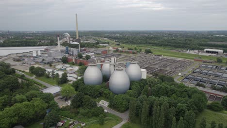 Sludge-tanks-at-a-swerage-treatment-plant-in-Bottrop-Germany,-aerial-view