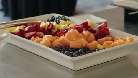 Colorful-Fruit-Platter-in-White-Dish-Mixed-Berries