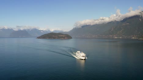 Ferry-Boat-Carrying-Passengers-Cruising-In-The-Howe-Sound-With-Bowyer-Island-In-West-Vancouver,-BC,-Canada