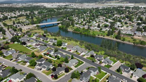 Wide-aerial-shot-pulling-away-from-the-Spokane-River's-neighborhoods