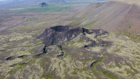 Aerial-orbiting-shot-of-tremendous-icelandic-Sto-ra-Eldborg-Volcano-on-Iceland-Island-during-summer