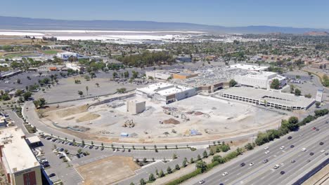 Aerial-hyper-lapse:-shopping-mall-demolished---concept:-death-of-brick-and-mortar-stores,-eCommerce,-renovation,-real-estate-in-California