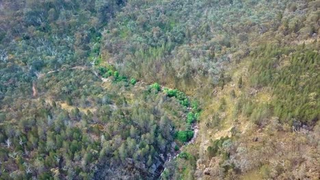 Aerial-view-over-Spring-Creek,-above-the-Beechworth-Cascades,-in-north-east-Victoria,-Australia-November-2021