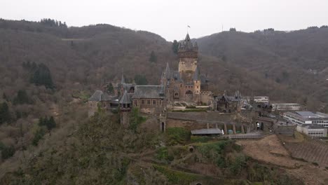 beautiful-close-up-drone-shot-of-the-castle-in-cochem-city-next-to-the-river-moselle-in-germany