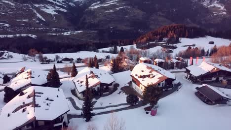 Swiss-Village-in-Winter-From-Drone-View