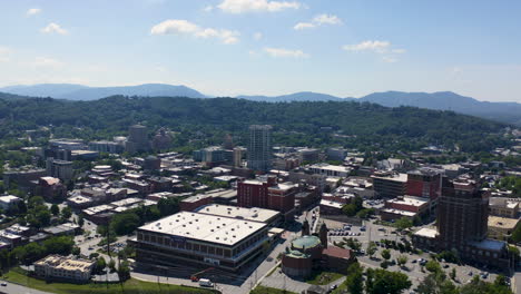 Drone-Aerial-over-Downtown-Asheville-with-mountains-in-the-Background