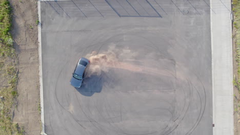 Top-down-View-From-Drone-Drifting-Car-In-Drift-Area-During-Summer