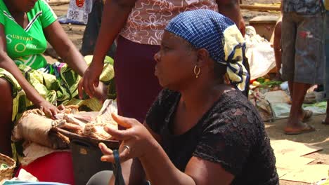 Woman-at-the-market-to-sell-or-trade-homemade-items-at-the-market