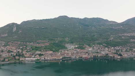 Aerial-view-of-Lake-Iseo-and-the-city-of-lovere-which-runs-along-the-lake-at-morning,Bergamo-Italy