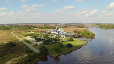 Drone-Orbit-over-a-Navy-Ship-Docked-on-a-River-in-South-Carolina