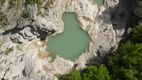 rotary-motion-drone-headshot-of-Albanian-canyon-"Syri-i-ciklopit