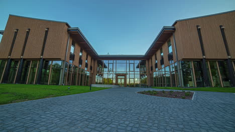 Wide-angle-shot-of-a-modern-architecture-building-with-glass-and-wooden-elements