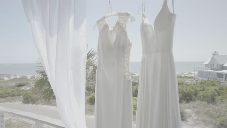 Beautiful-wedding-dresses-hanging-ready-for-two-brides