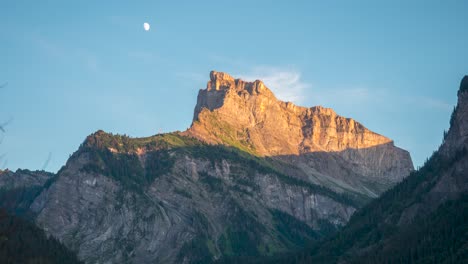 Time-Lapse-of-a-moon-phase-across-a-mountain-peak