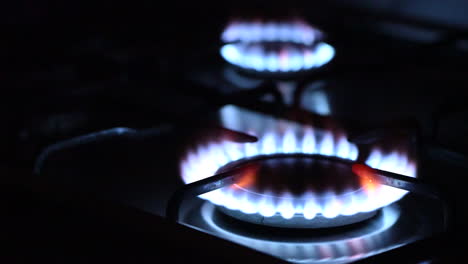 Gas-igniting-on-the-stove-in-the-kitchen-in-the-dark