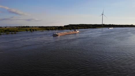 Aerial-View-Over-Oude-Maas-Towards-With-Sight-Of-Brandini-Inland-Tanker-Passing-By