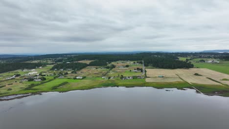 Aerial-view-of-farm-land-surrounding-Swan-Lake-on-Whidbey-Island